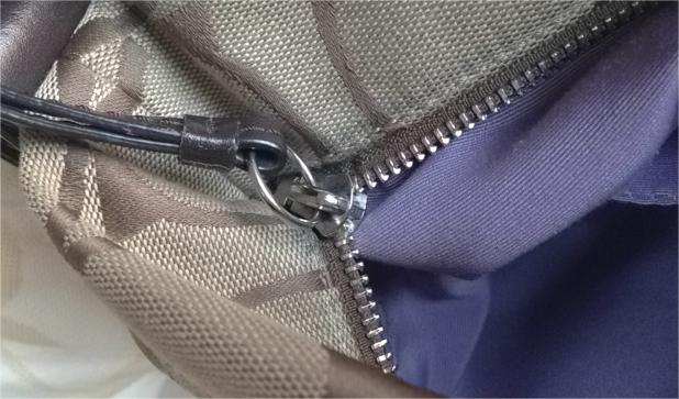 broken zipper of bags